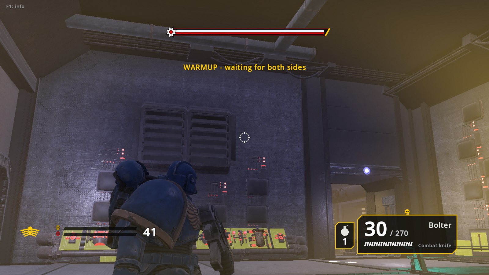 A first-person view of a factory wall with a yellow glow at the screen edge