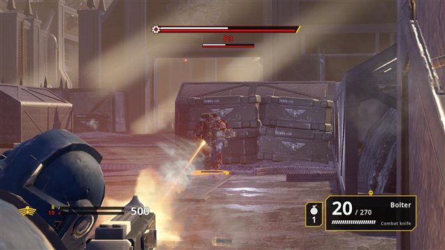 Aim mode over the shoulder: a muzzle flash and a Chaos Marine in the crosshair.